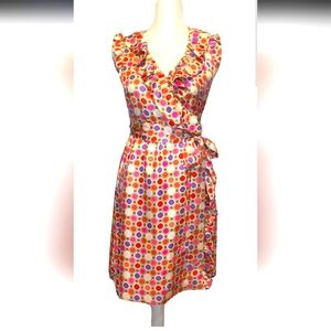 Kate Spade Dress size  Aubery wrap dress 100% silk. Wraps around waist .